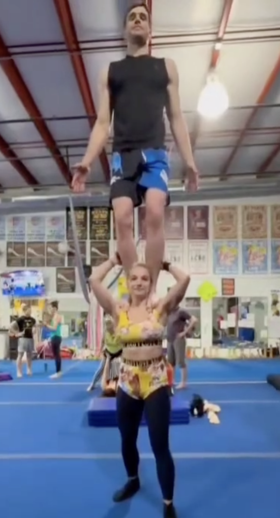 Three-person acro stack