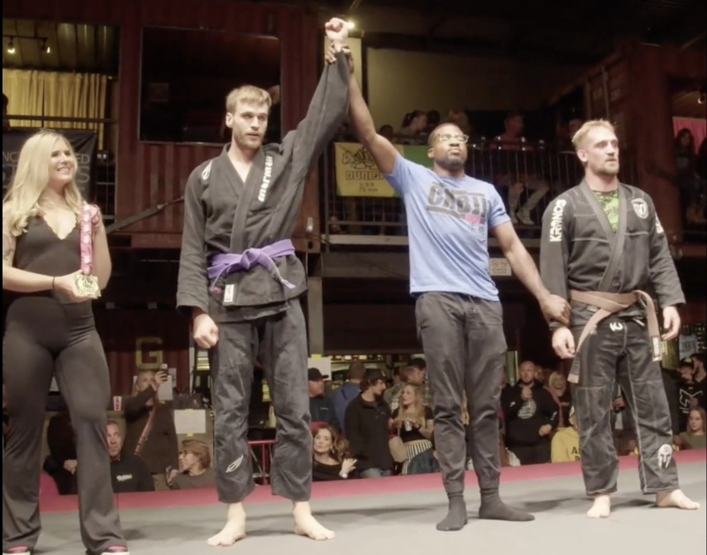 Competition win — hand raised